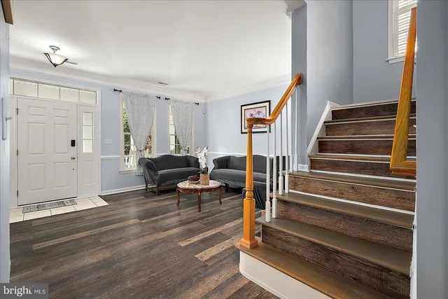 a bathroom with a sink a mirror and a toilet