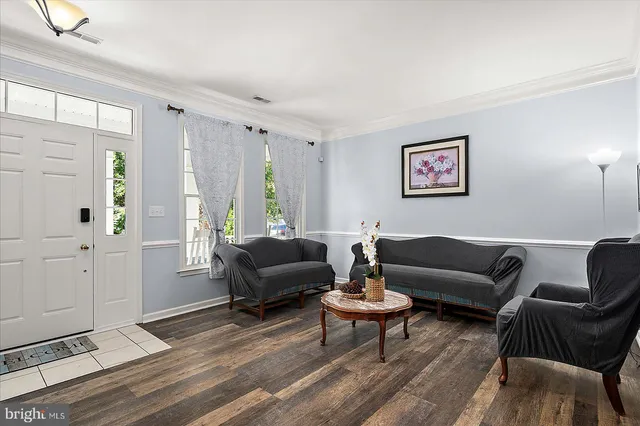 a bedroom with a bed lamp closet and window