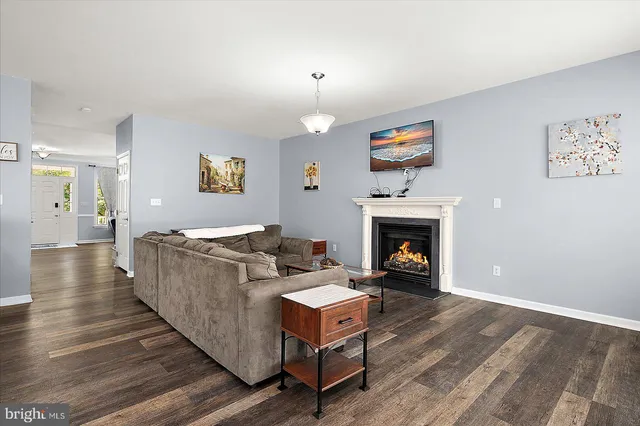 a view of a house with a yard and garage