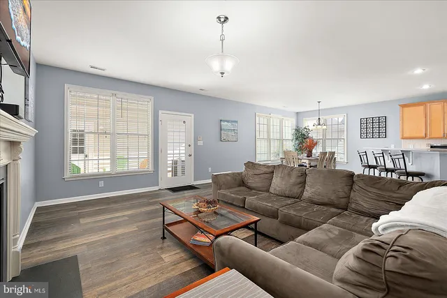 a view of a lake with houses in the back