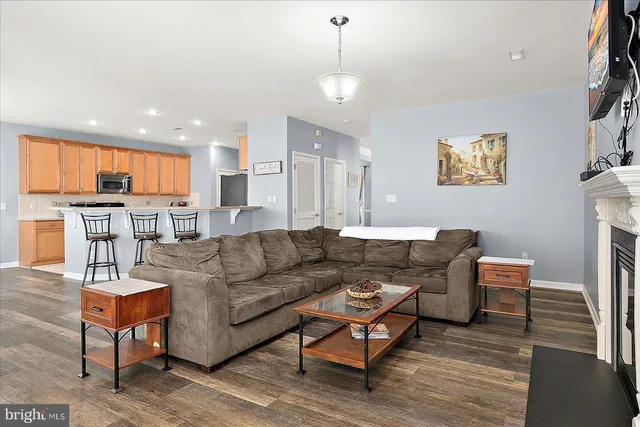 a view of a chairs and table in the backyard