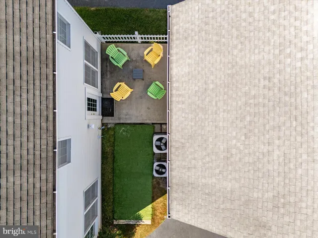 a view of a chair and table of the house
