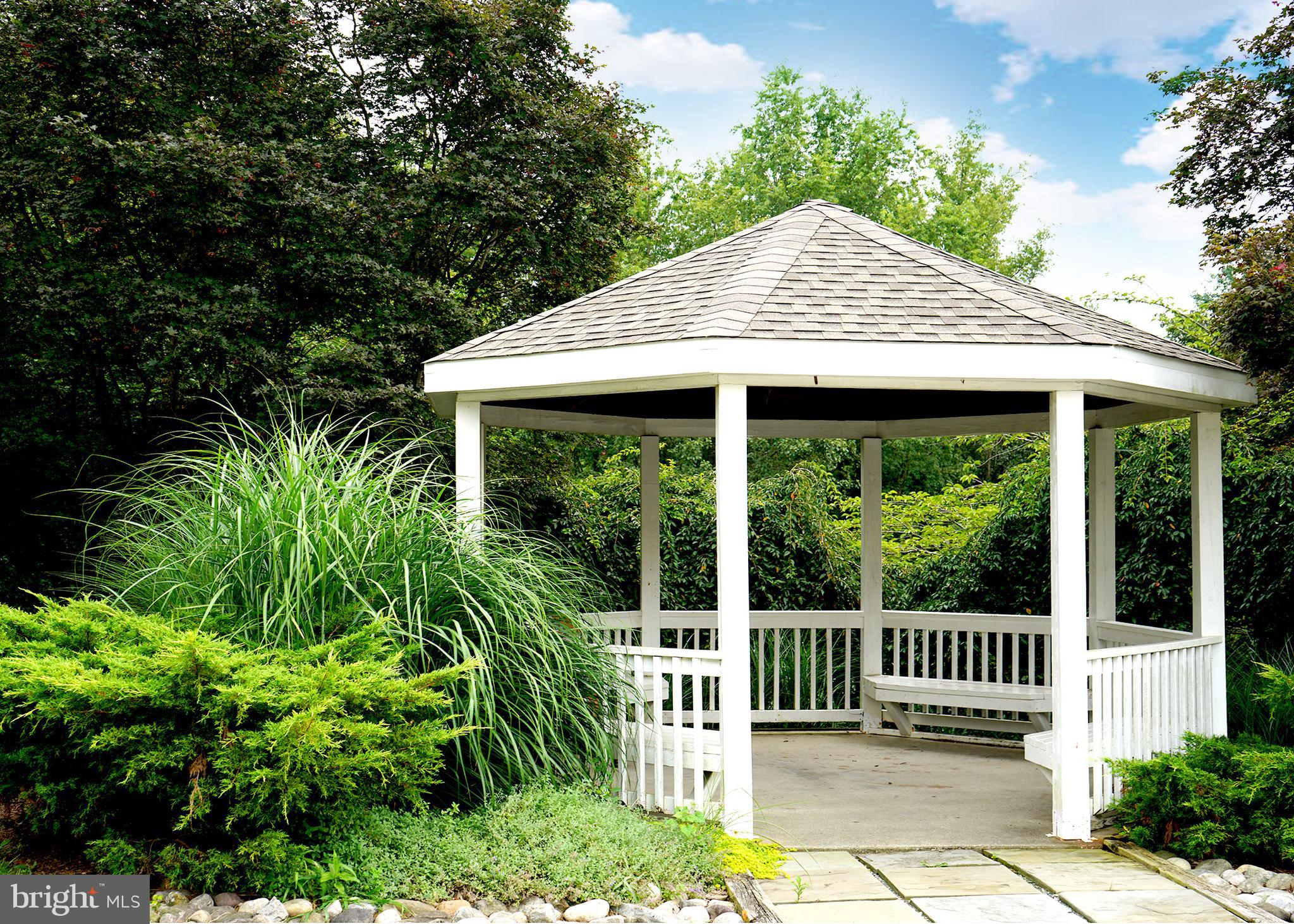 12004 Amber Ridge Circle, Unit B303 Germantown, MD 20876 - Photo 25 of 25 a house view with a garden space