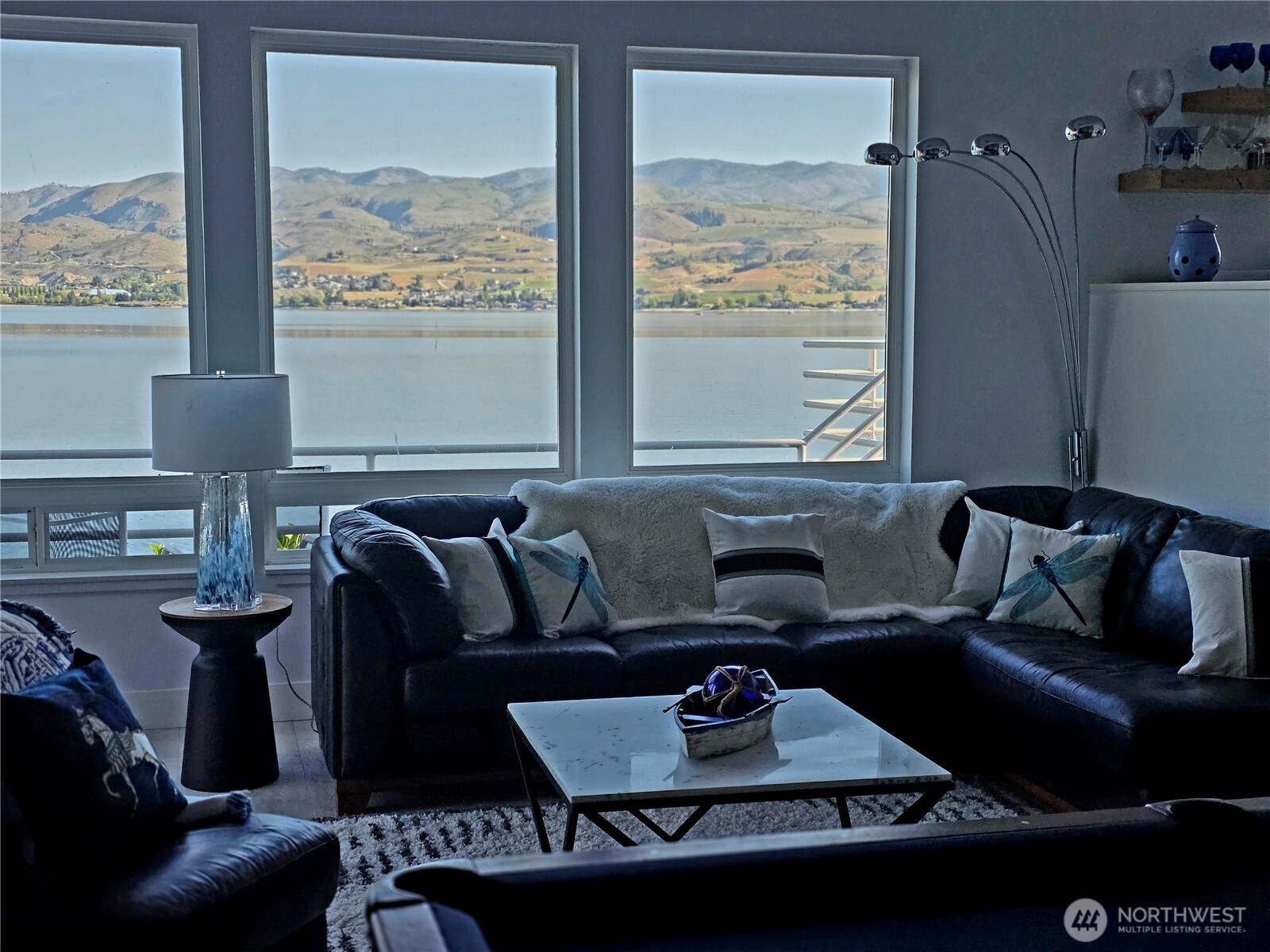 2685 South Lakeshore Road Chelan, WA 98816 - Photo 2 of 16 a living room with furniture and a large window