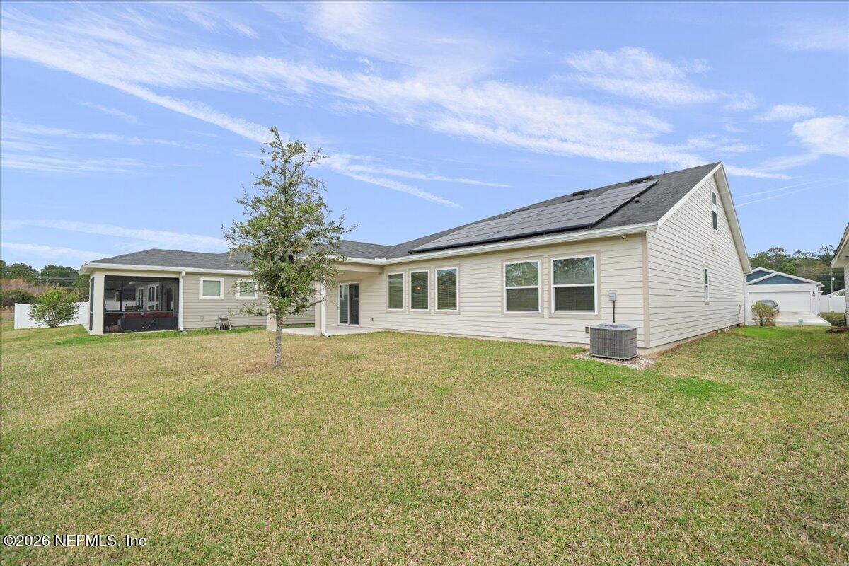 12032 Bridgehampton Road Jacksonville, FL 32218 - Photo 36 of 52 a front view of house with yard and trees
