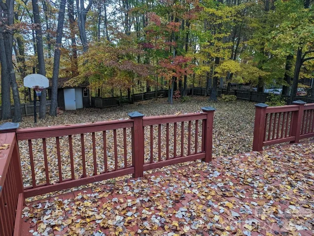 a view of a street with flower garden