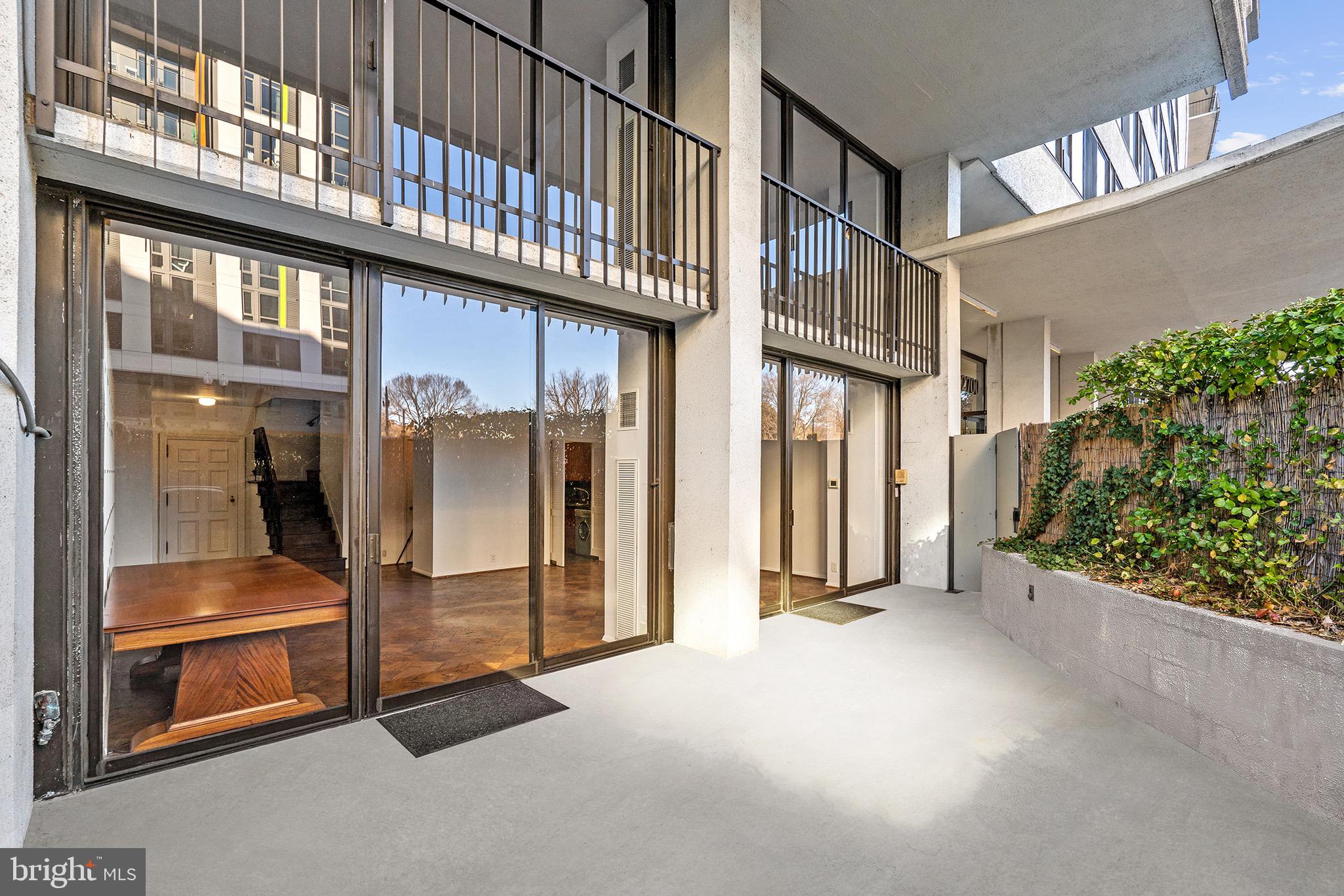 2700 Virginia Avenue Northwest, Unit 109 Washington, DC 20037 - Photo 2 of 47 a view of entryway with a balcony