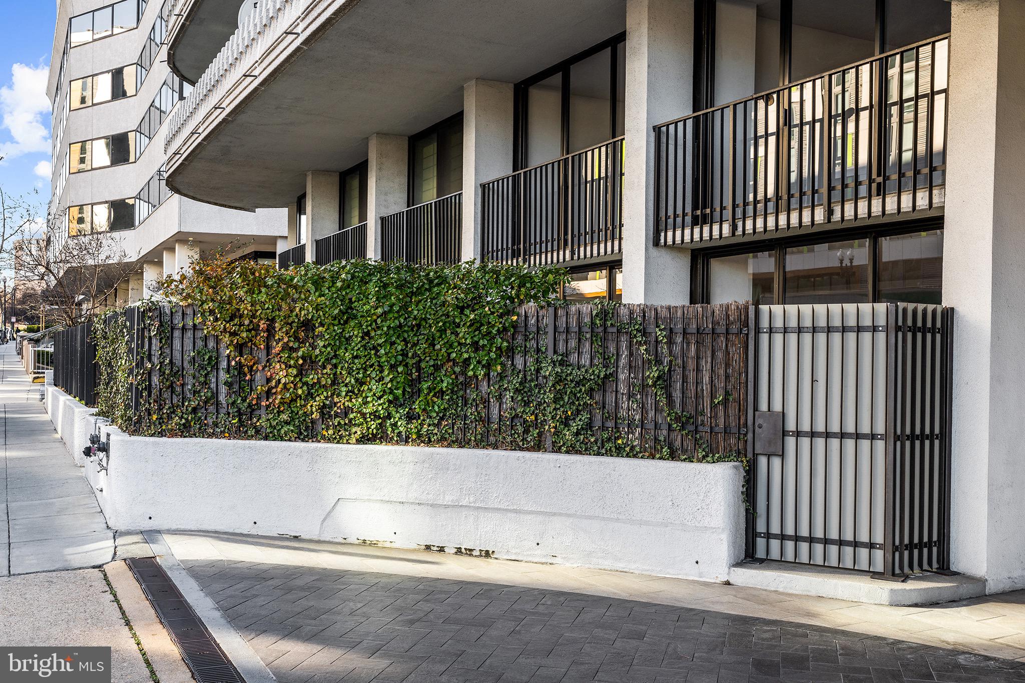 2700 Virginia Avenue Northwest, Unit 109 Washington, DC 20037 - Photo 29 of 47 a view of outdoor space and yard