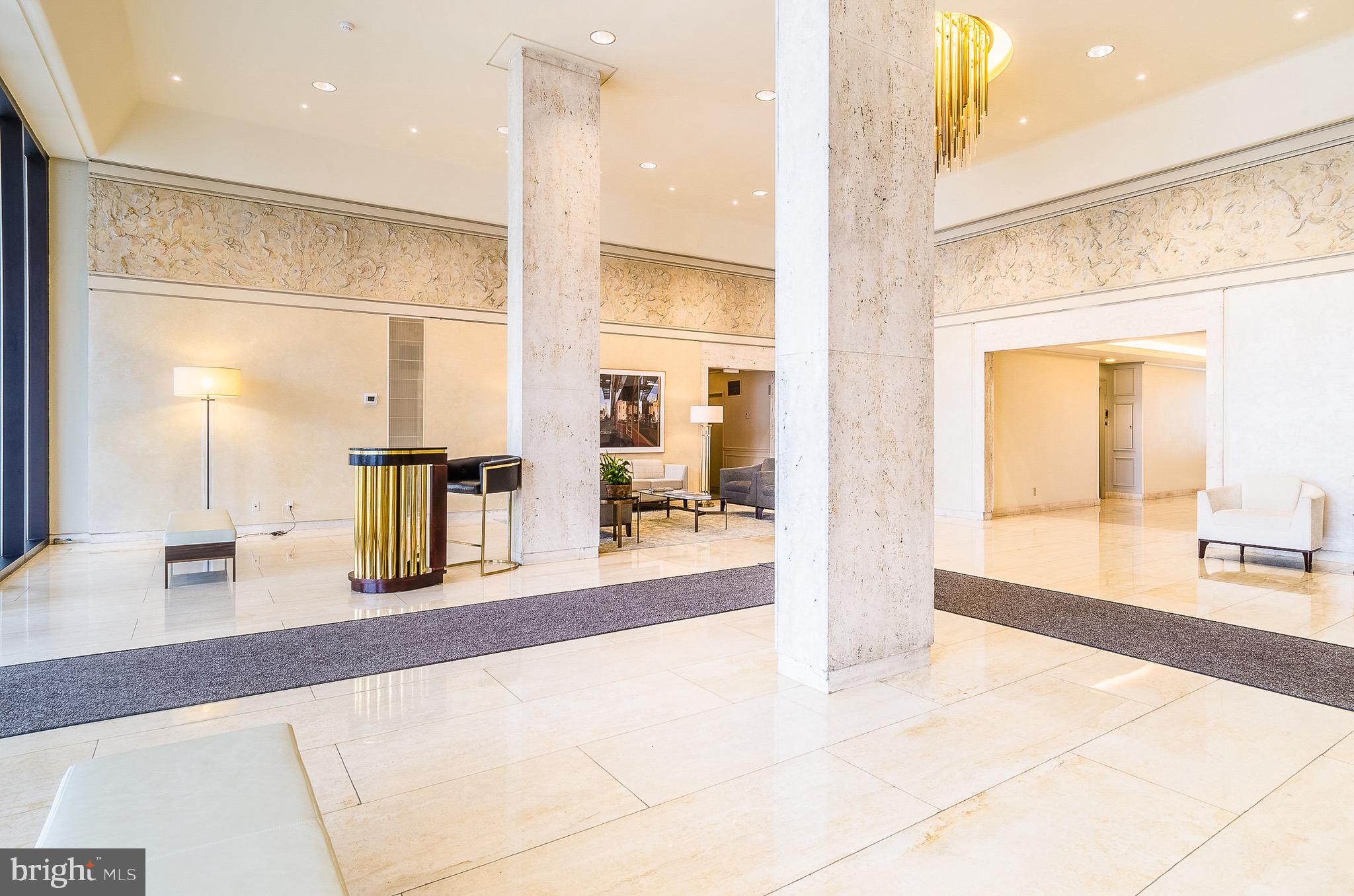 2700 Virginia Avenue Northwest, Unit 109 Washington, DC 20037 - Photo 35 of 47 a large bathroom with a glass shower door