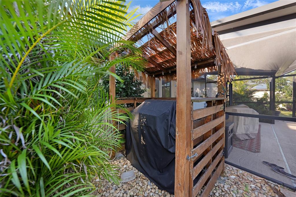 13064 Feldman Avenue Port Charlotte, FL 33981 - Photo 11 of 13 a view of a backyard