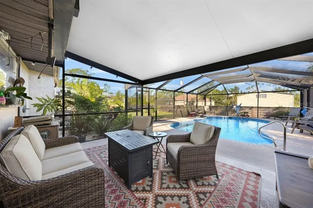a balcony with furniture and outdoor view