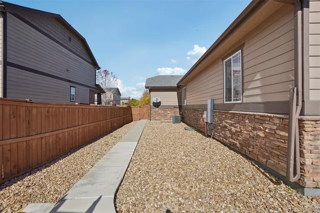 a view of a backyard of the house