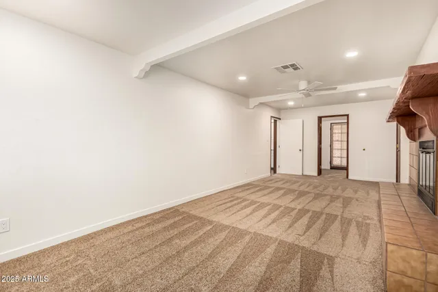 a view of a livingroom with a staircase