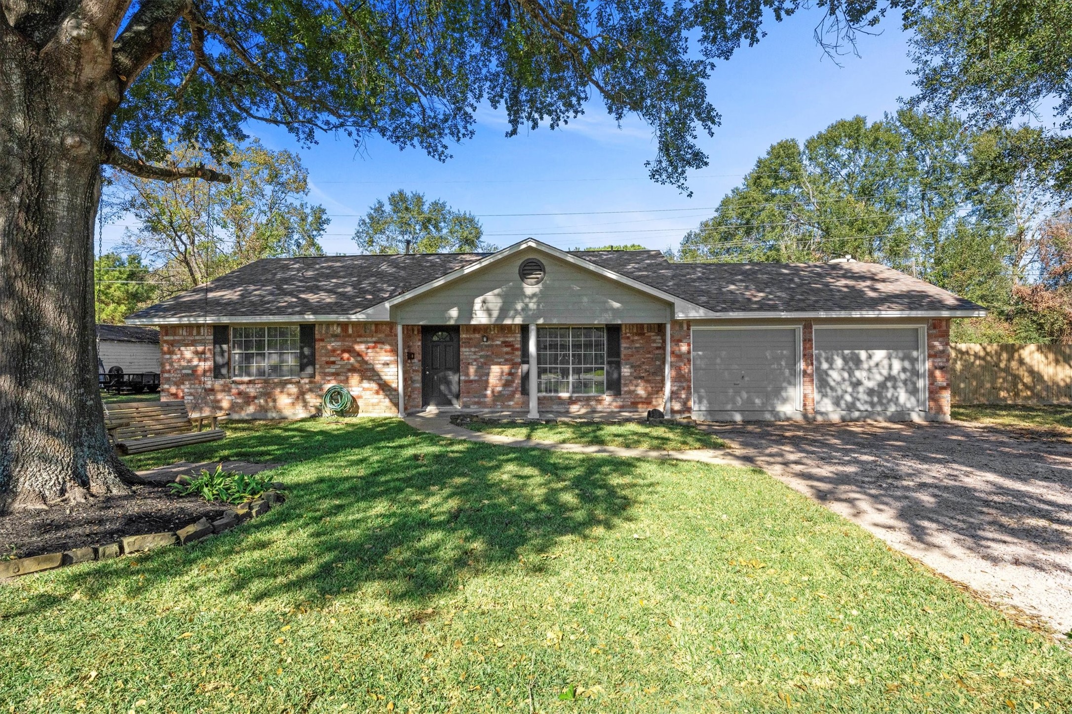 104 Anna Street Tomball, TX 77375 - Photo 1 of 32 This charming single-story brick home features a welcoming facade. It is shaded by mature trees, offering both curb appeal and a serene atmosphere. This is the last house on the street. So, no through traffic and no neighbors to the right.