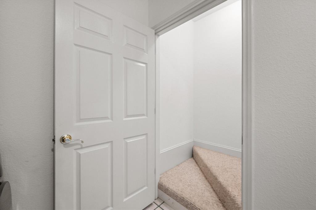 13021 Rudy's Way Streetman, TX 75859 - Photo 23 of 40 Built-in stairway access near Dallas leading to a large upstairs bonus room for extra flexible space.