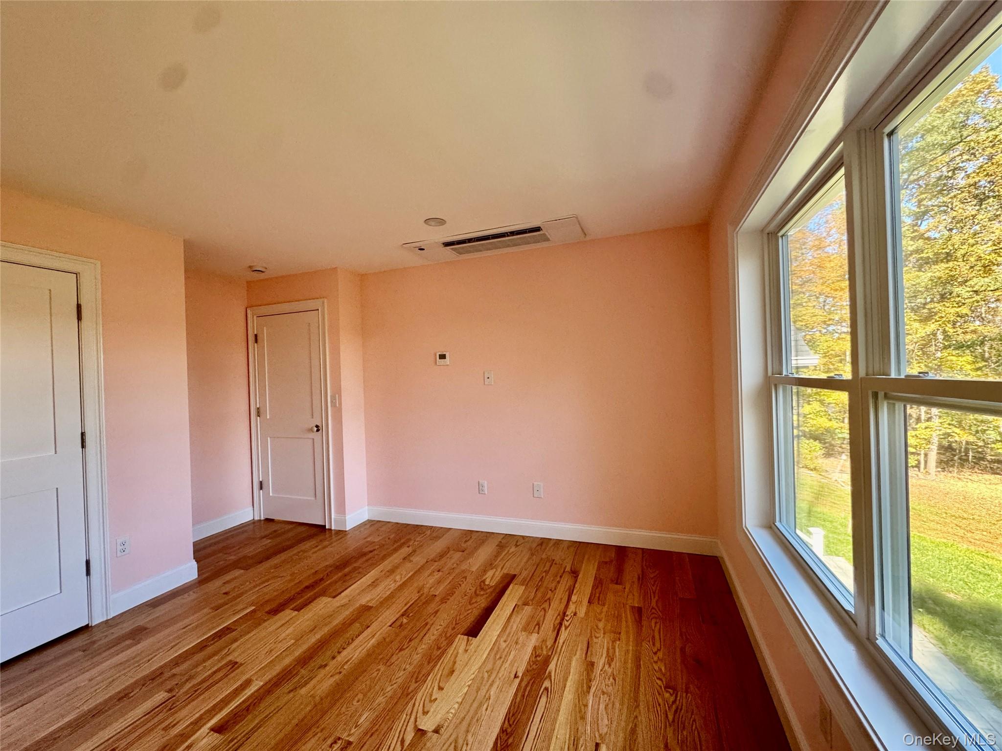 4 Webster Place Patterson, NY 12563 - Photo 13 of 42 a view of empty room with wooden floor and fan