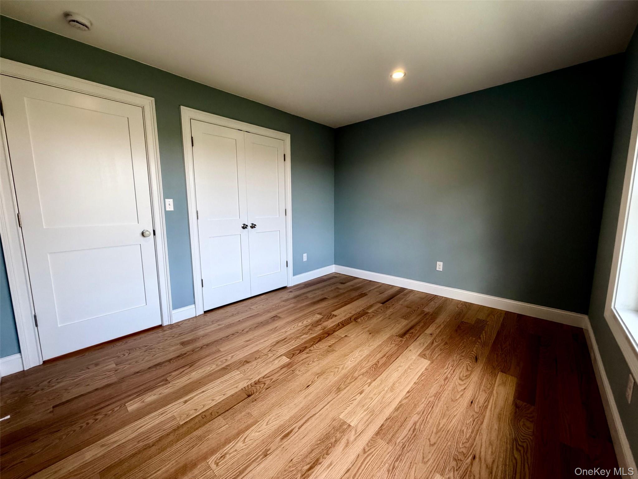4 Webster Place Patterson, NY 12563 - Photo 19 of 42 a view of empty room with wooden floor