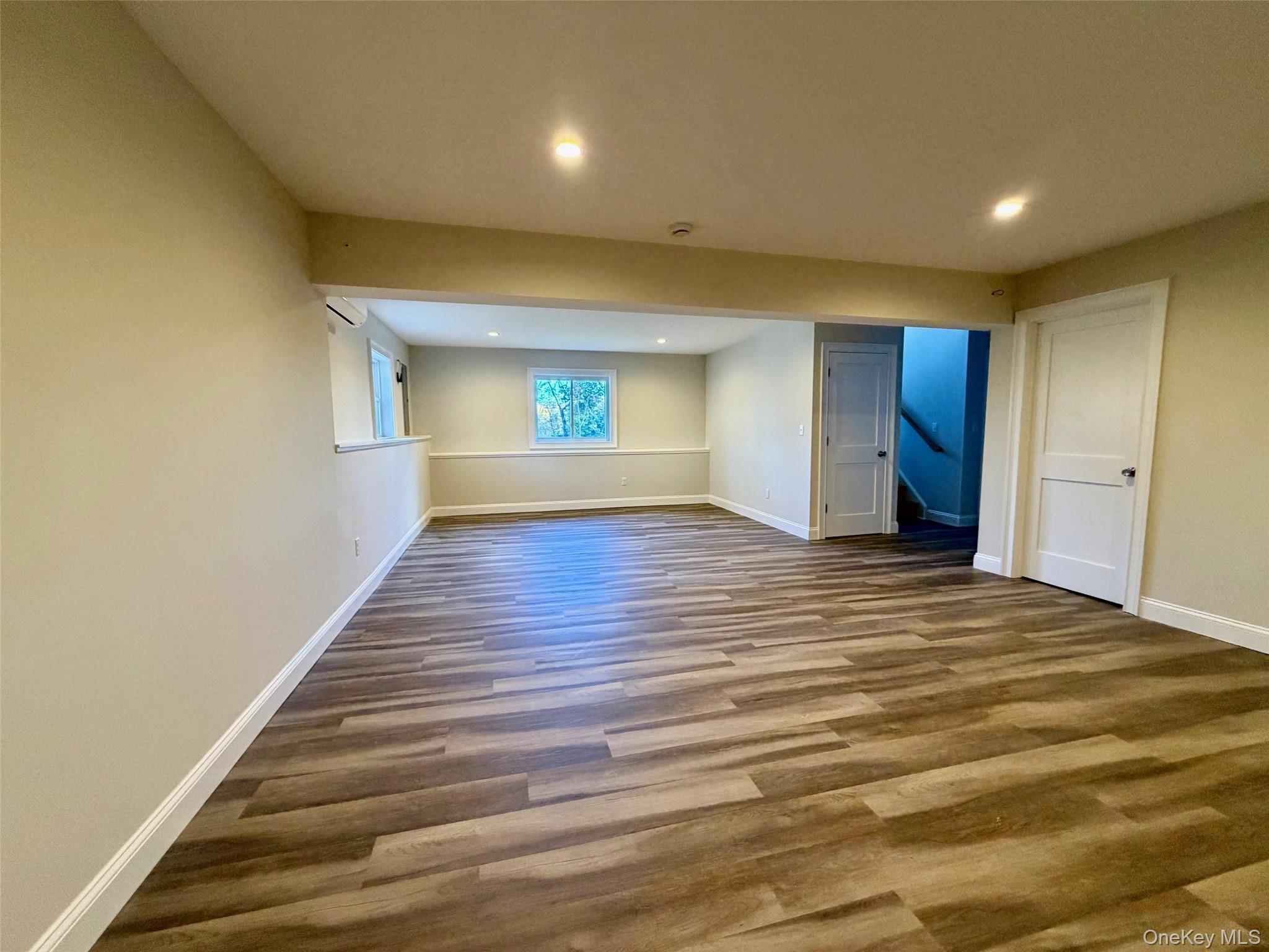 4 Webster Place Patterson, NY 12563 - Photo 21 of 42 a view of an empty room with wooden floor and a window