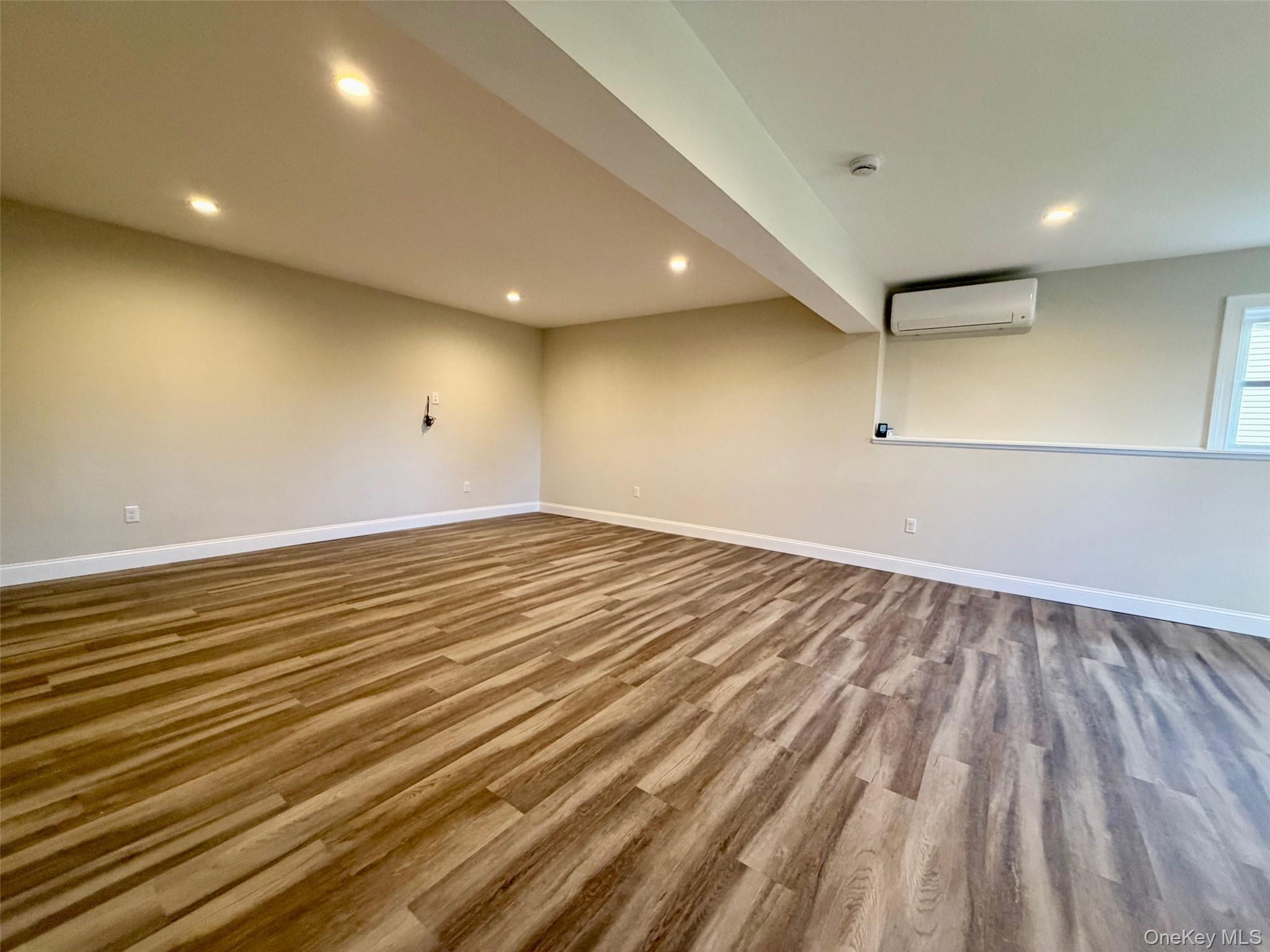 4 Webster Place Patterson, NY 12563 - Photo 22 of 42 an empty room with wooden floor