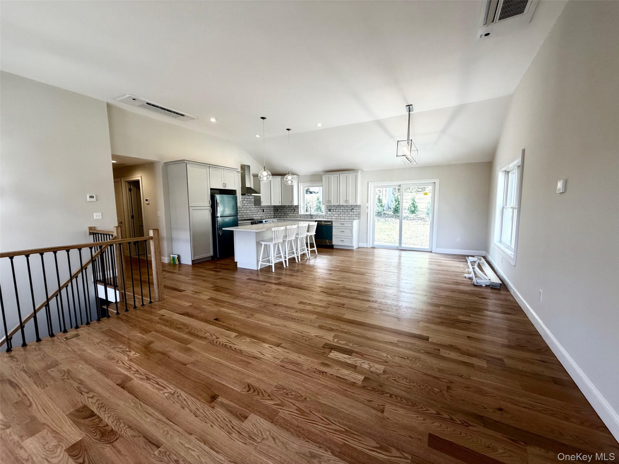 4 Webster Place Patterson, NY 12563 - Photo 5 of 42 a view of kitchen with wooden floor and window