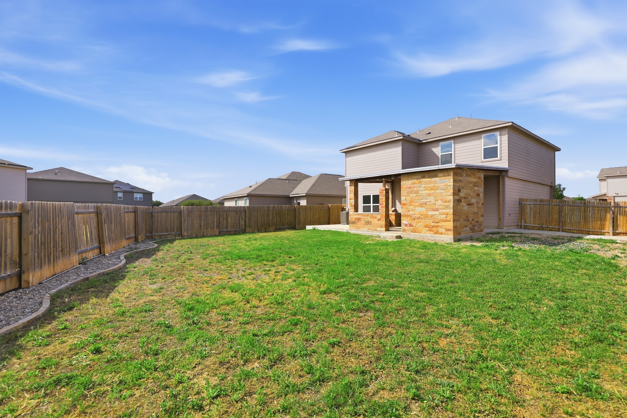 300 Hyacinth Way Jarrell, TX 76537 - Photo 35 of 37 a front view of a house with garden