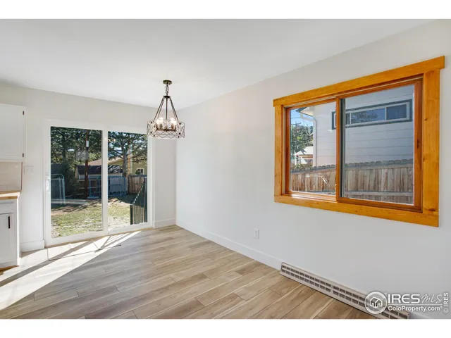 a view interior of a house with wooden floor and windows