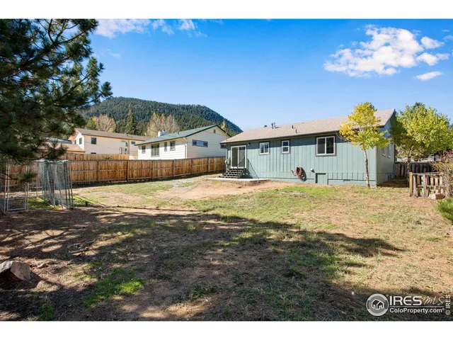 a view of a house with a swimming pool