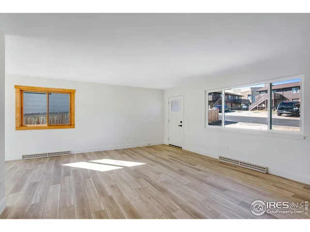 a view of an empty room with window
