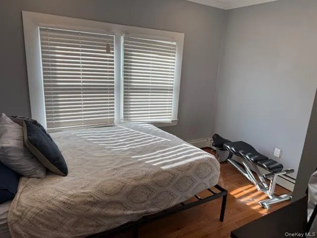 a kitchen with stainless steel appliances granite countertop a refrigerator a sink a stove a washer dryer and a refrigerator