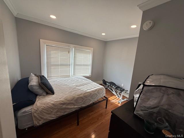 3 Union Place, Unit B Huntington, NY 11743 - Photo 12 of 15 a bedroom with bed and window