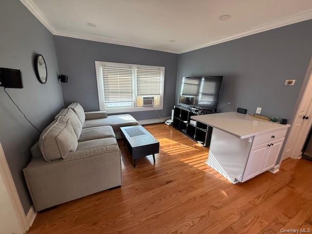 3 Union Place, Unit B Huntington, NY 11743 - Photo 8 of 15 a living room with furniture and a large window
