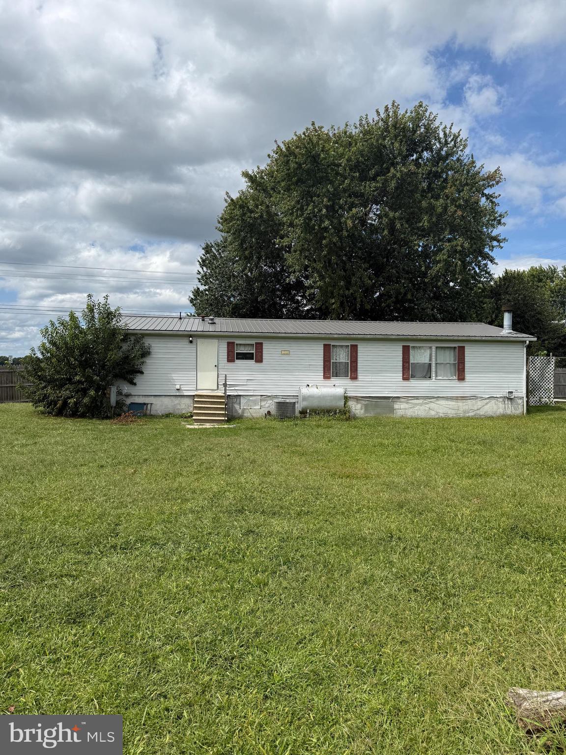 2418 Seeneytown Road Dover, DE 19904 - Photo 2 of 20 a view of house with outdoor space and garden