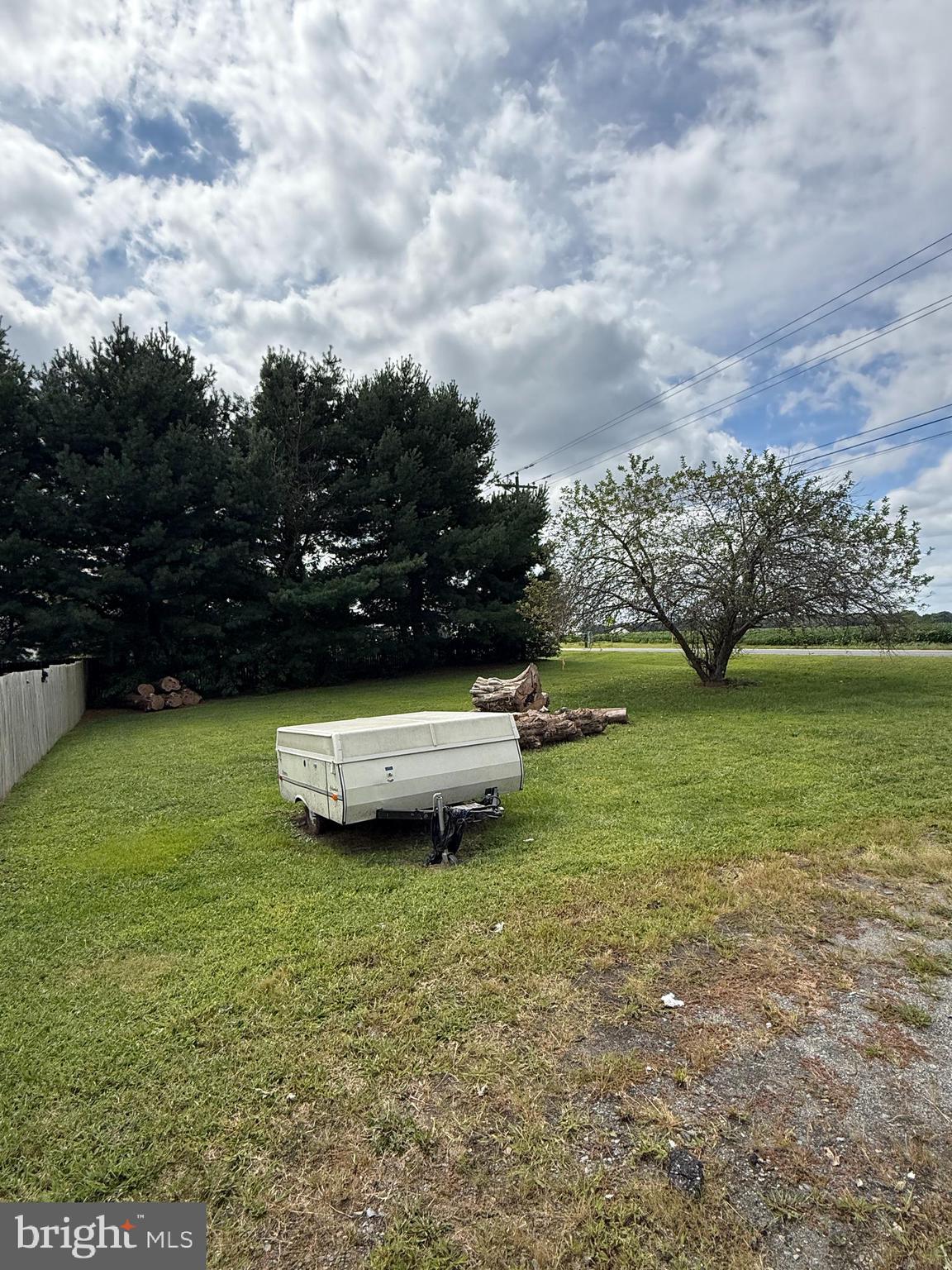 2418 Seeneytown Road Dover, DE 19904 - Photo 4 of 20 a view of a lake with a yard