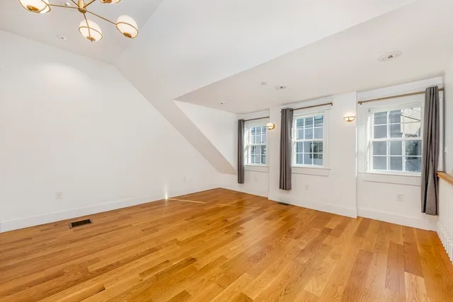 a view of empty room with windows