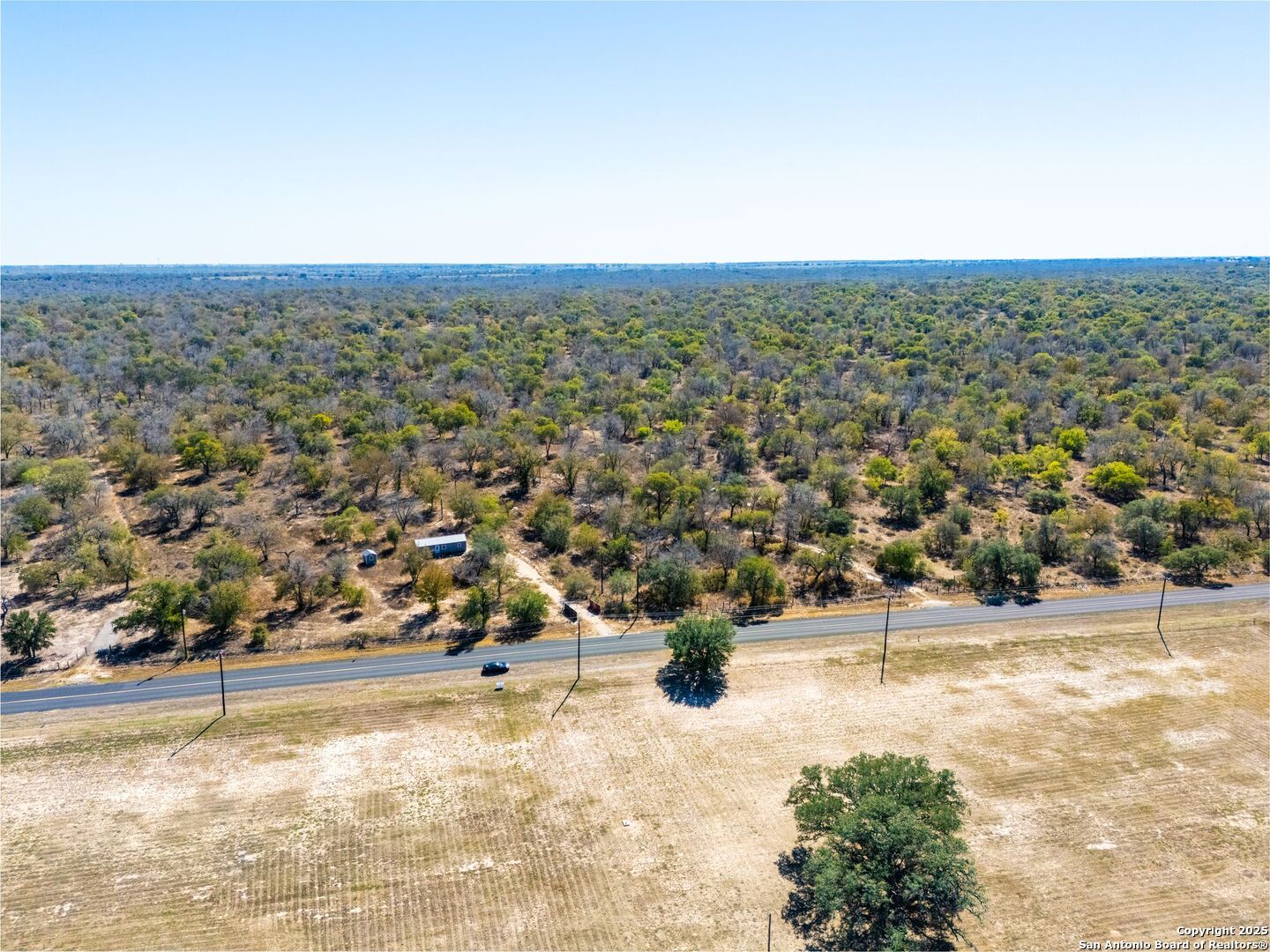 21270 Priest Road Elmendorf, TX 78112 - Photo 10 of 14 an aerial view of residential houses with yard