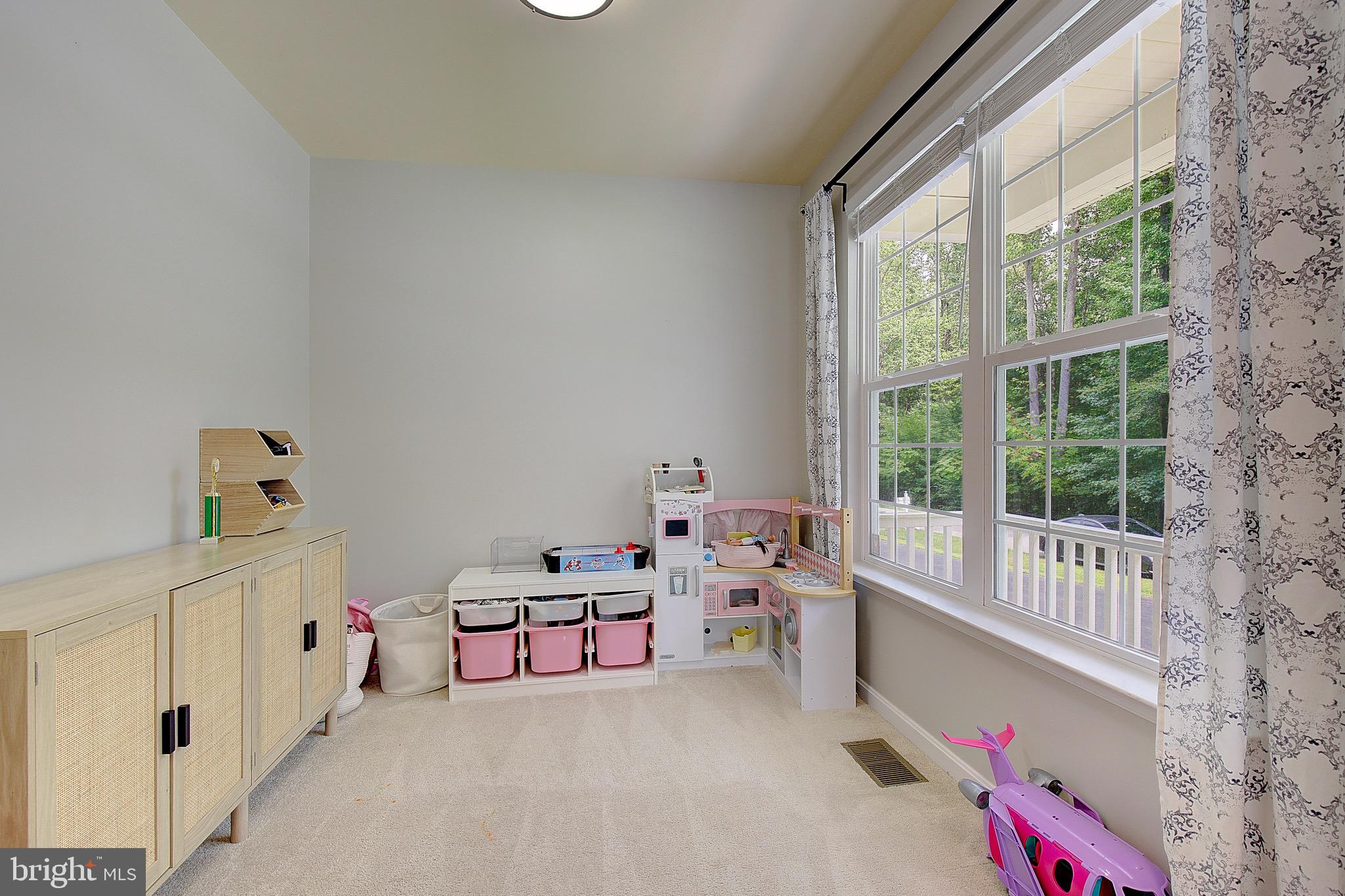 650 Stratton Place Prince Frederick, MD 20678 - Photo 19 of 51 a bedroom with a bed and a window