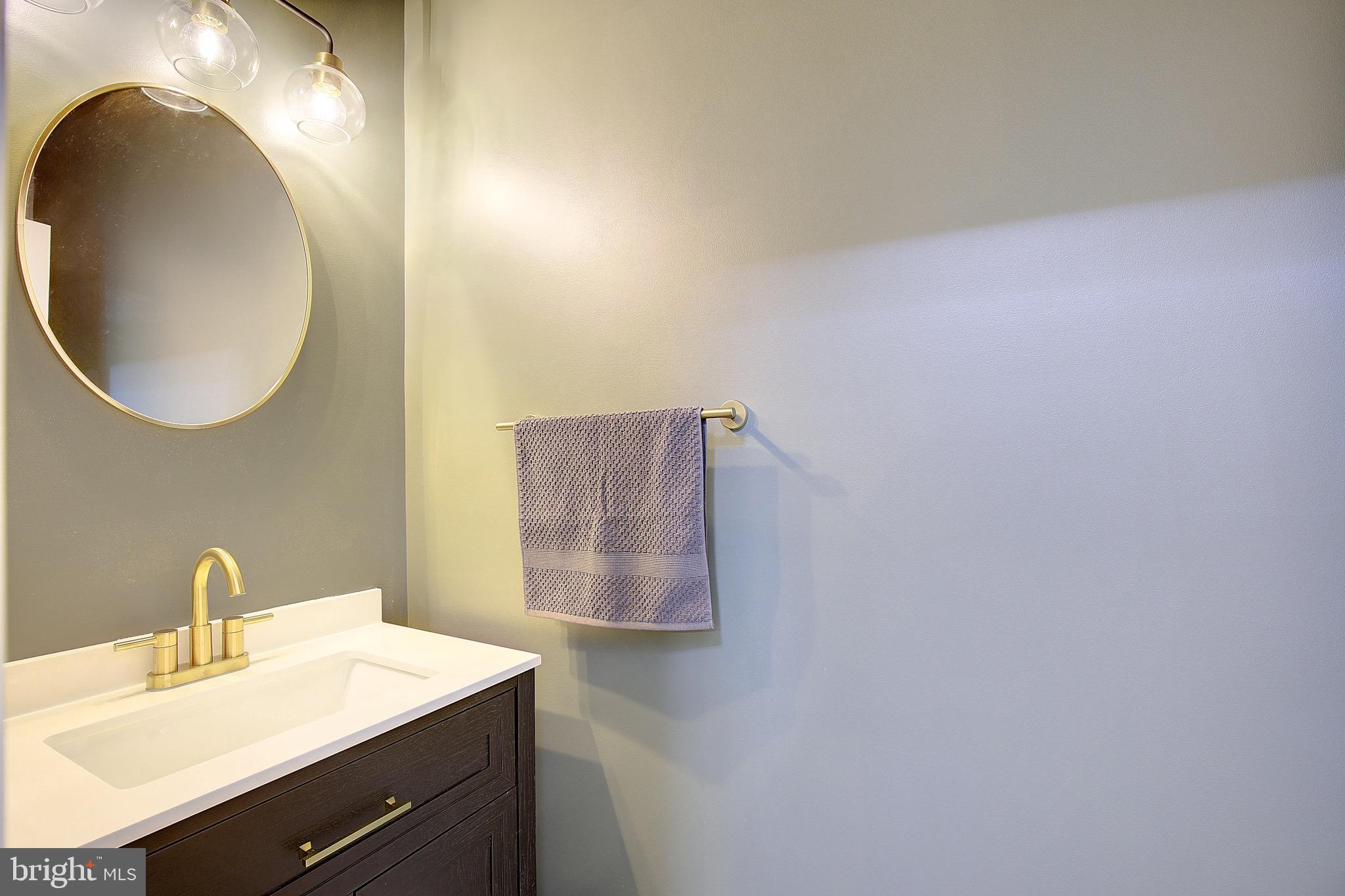 650 Stratton Place Prince Frederick, MD 20678 - Photo 20 of 51 a bathroom with a sink and a mirror