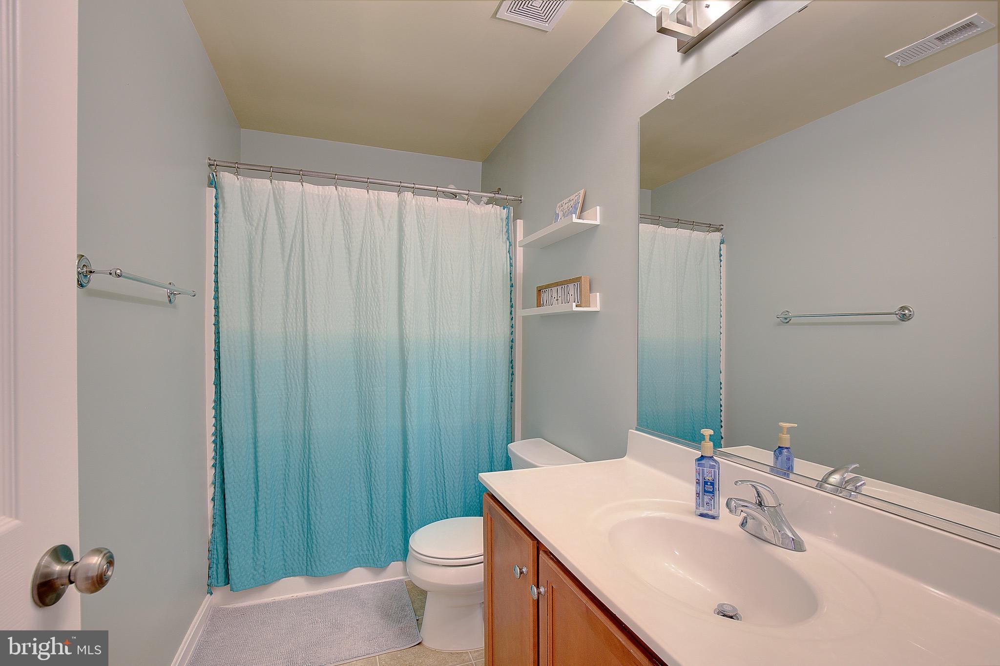 650 Stratton Place Prince Frederick, MD 20678 - Photo 21 of 51 a bathroom with a sink toilet and shower