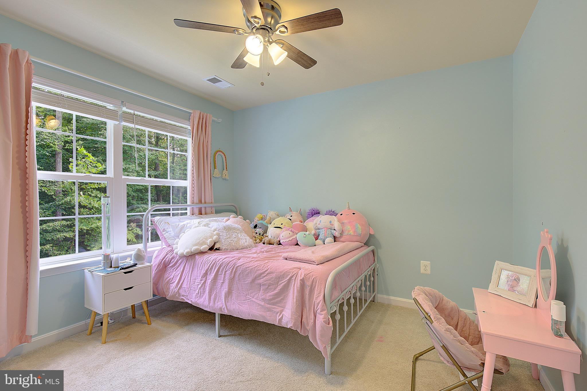 650 Stratton Place Prince Frederick, MD 20678 - Photo 22 of 51 a bedroom with a bed and a window