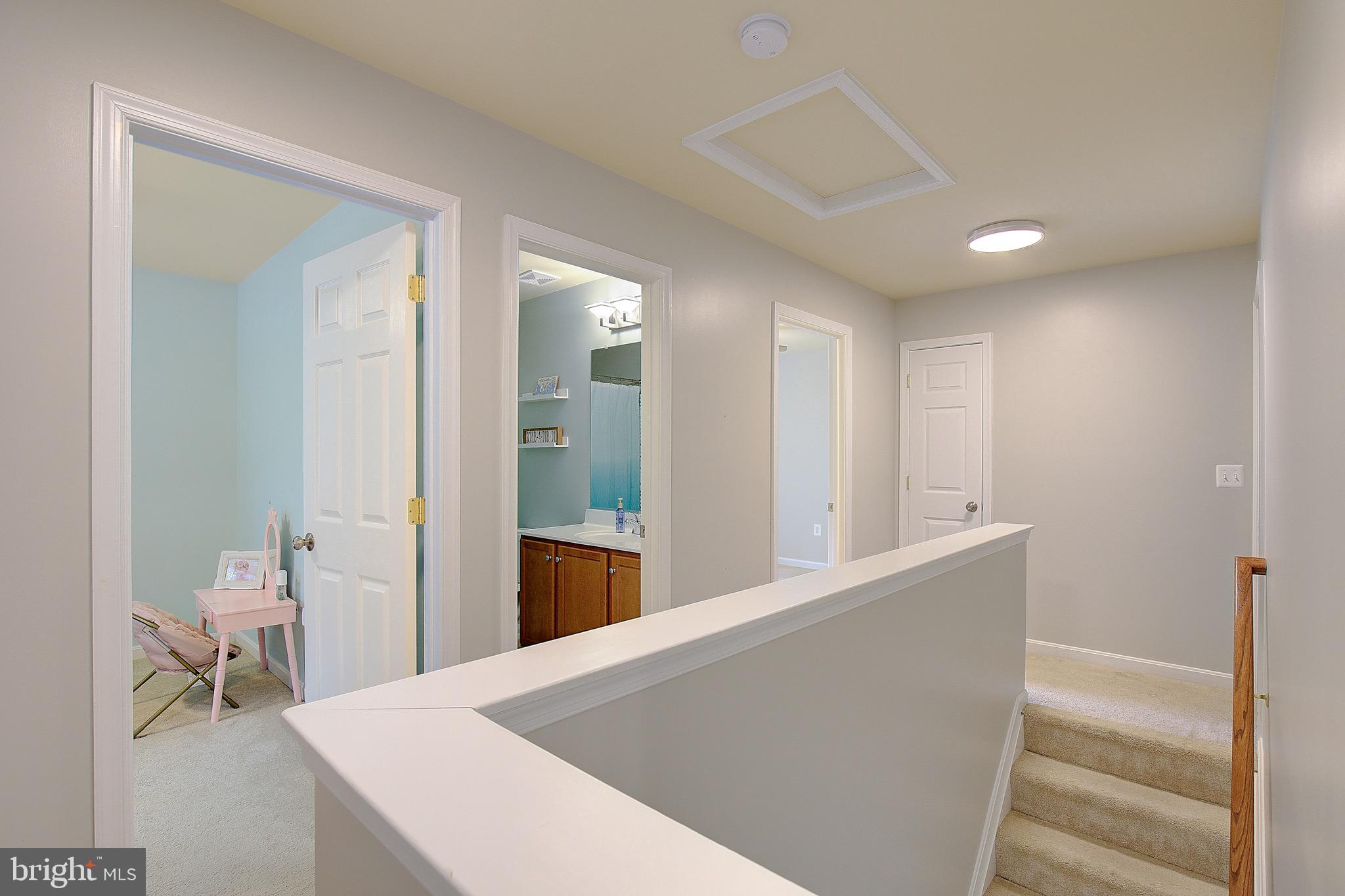 650 Stratton Place Prince Frederick, MD 20678 - Photo 24 of 51 a view of hallway with furniture and wooden floor