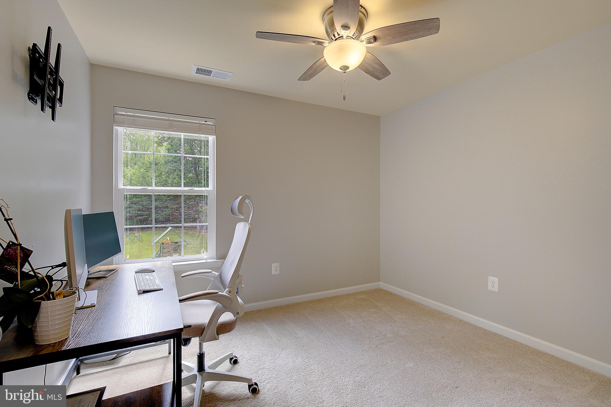 650 Stratton Place Prince Frederick, MD 20678 - Photo 25 of 51 a view of a workspace with furniture and a window