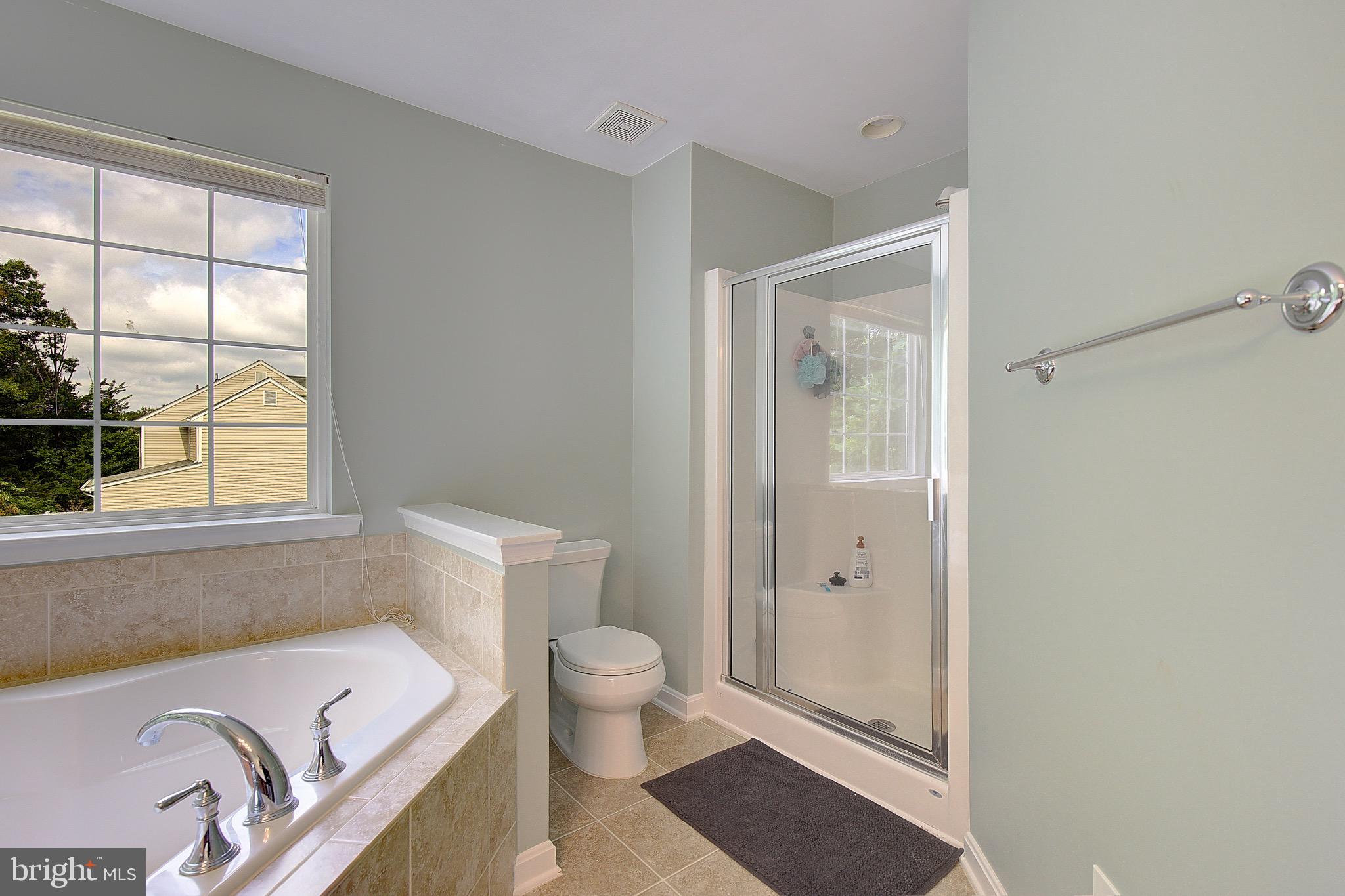 650 Stratton Place Prince Frederick, MD 20678 - Photo 30 of 51 a bathroom with a bathtub and sink