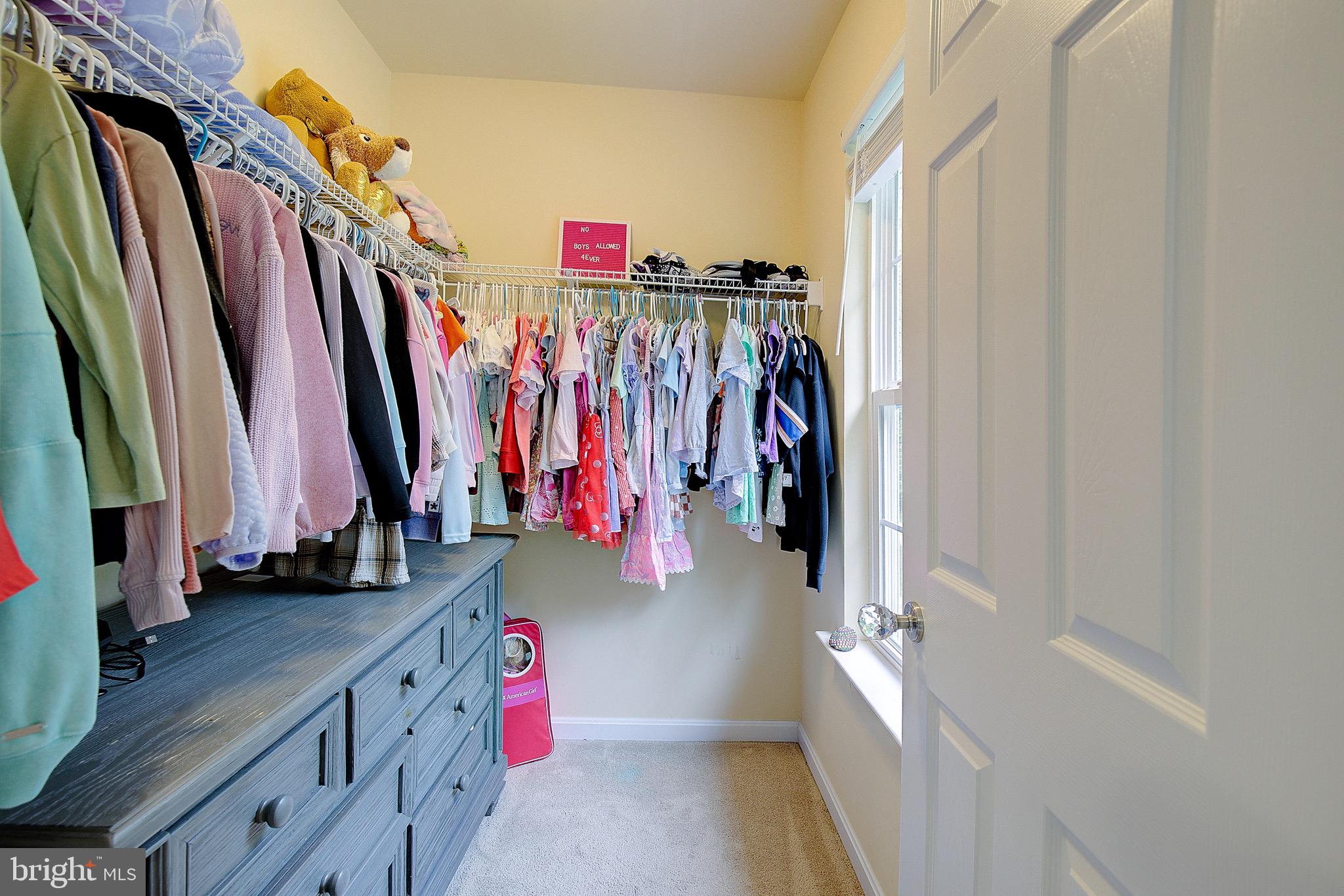 650 Stratton Place Prince Frederick, MD 20678 - Photo 39 of 51 a view of walk in closet with clothes