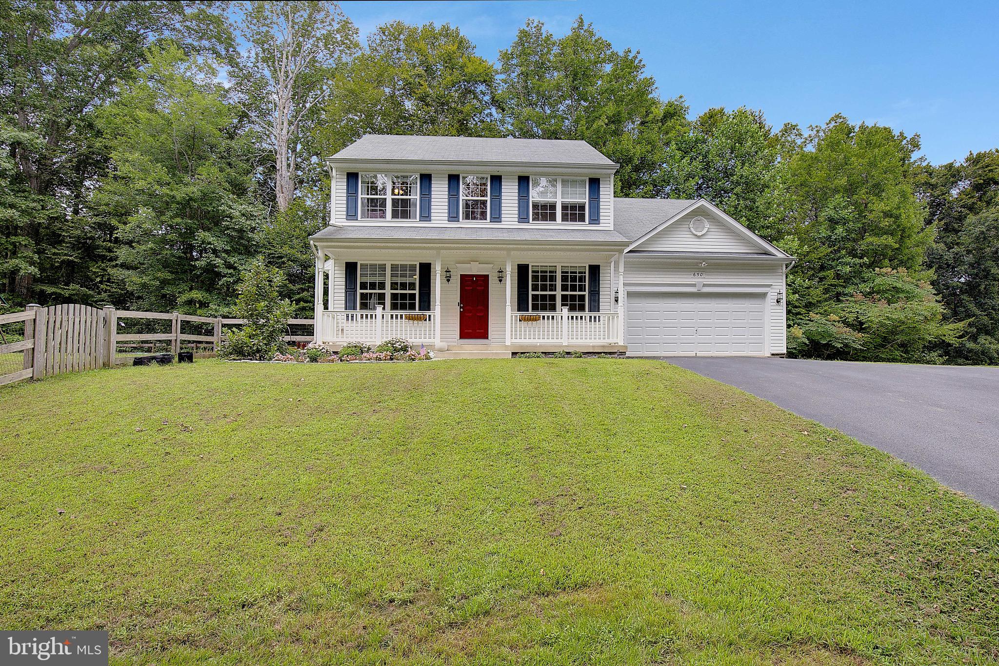 650 Stratton Place Prince Frederick, MD 20678 - Photo 41 of 51 a front view of a house with yard and green space