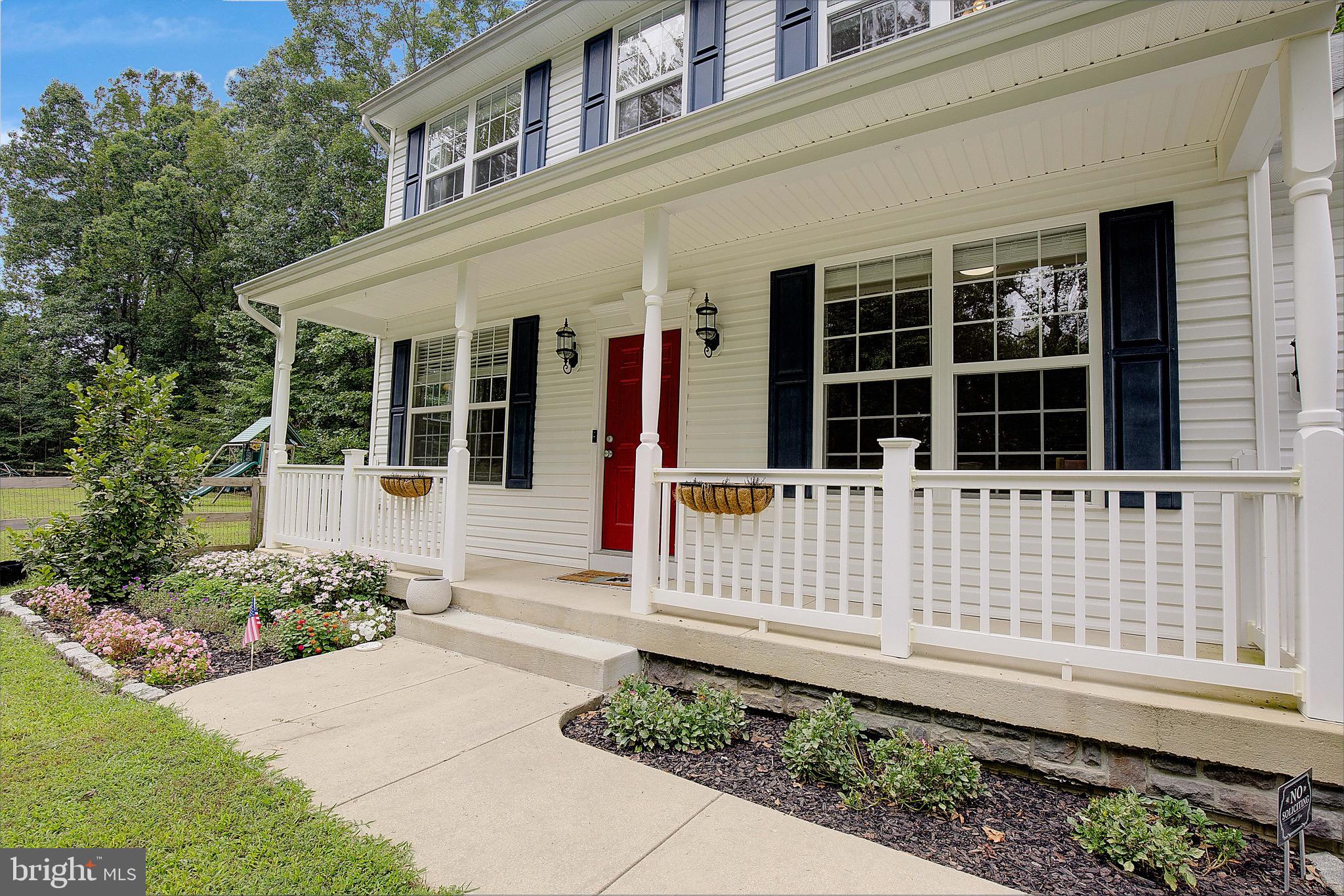 650 Stratton Place Prince Frederick, MD 20678 - Photo 43 of 51 a front view of a house with a garden
