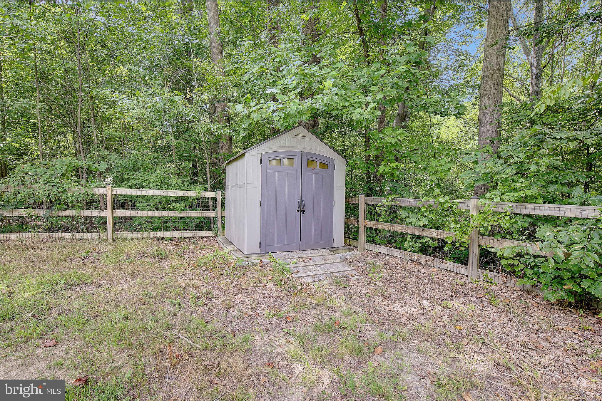 650 Stratton Place Prince Frederick, MD 20678 - Photo 44 of 51 a view of a house with a yard and large tree