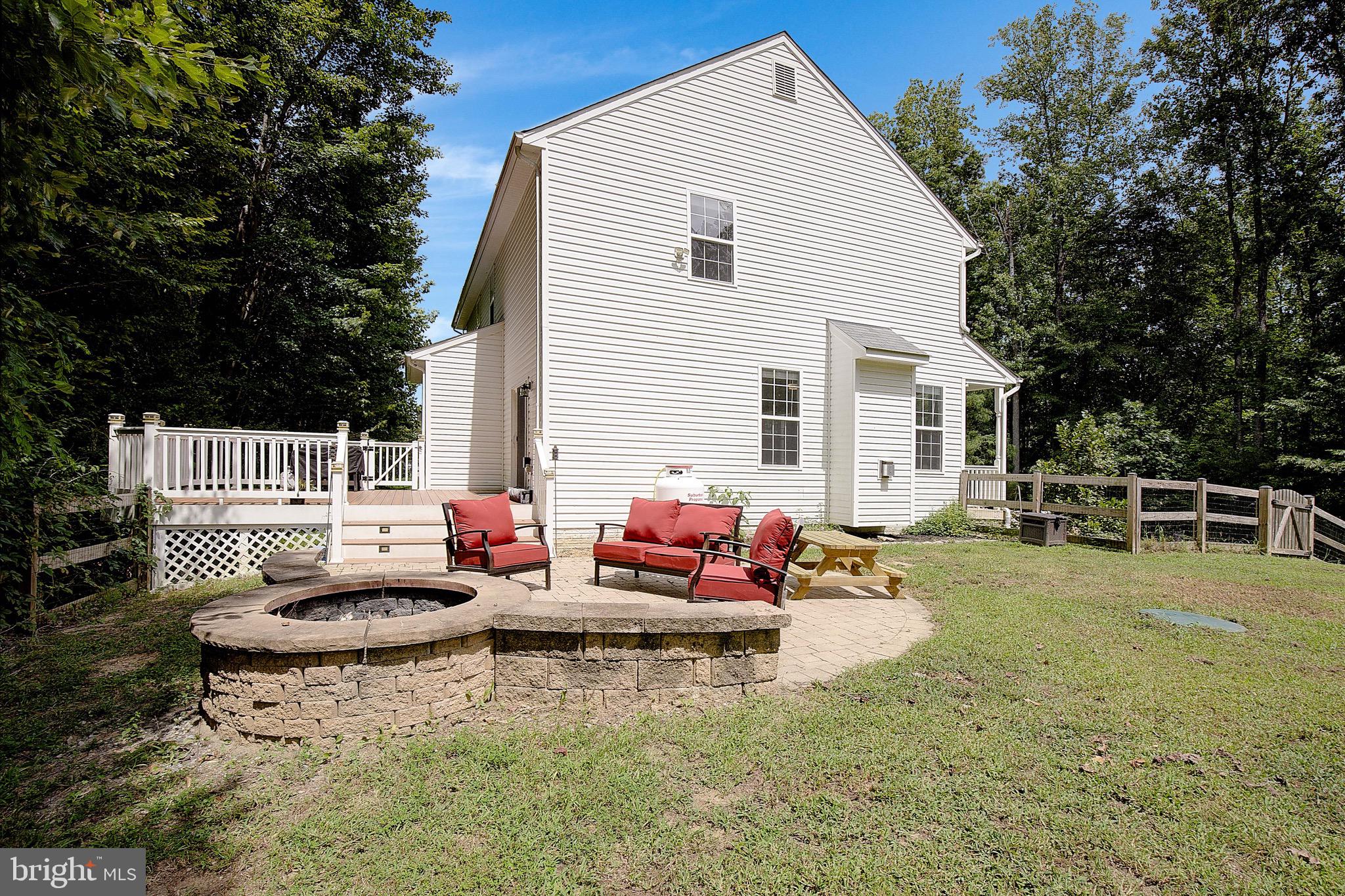 650 Stratton Place Prince Frederick, MD 20678 - Photo 49 of 51 a backyard of a house with seating space