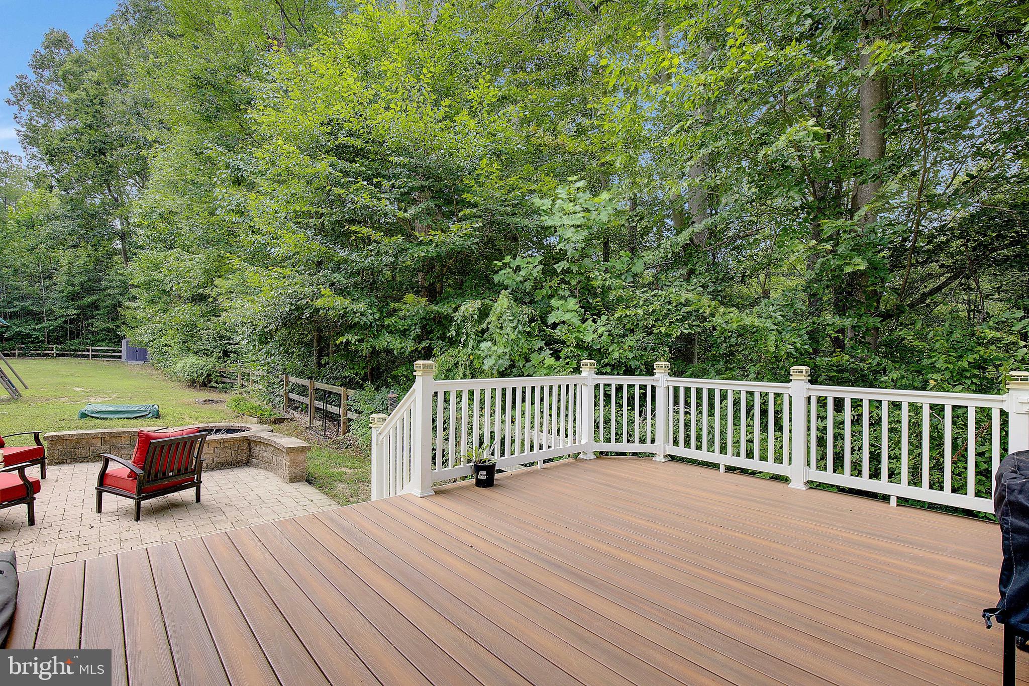 650 Stratton Place Prince Frederick, MD 20678 - Photo 51 of 51 a balcony with wooden floor table and chairs