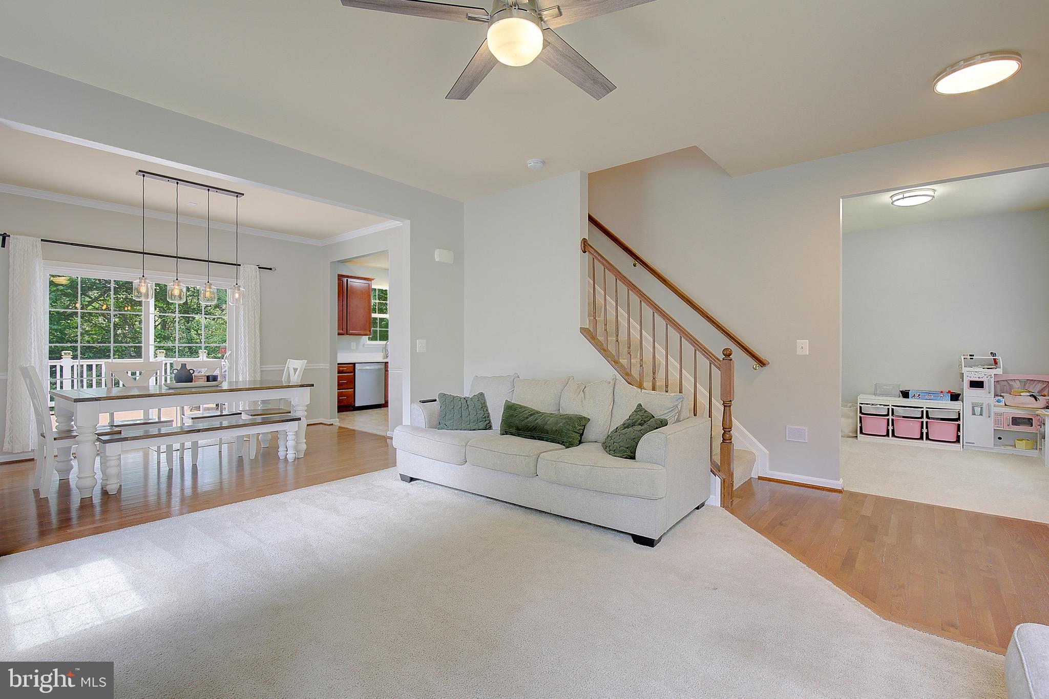 650 Stratton Place Prince Frederick, MD 20678 - Photo 7 of 51 a living room with furniture and a large window