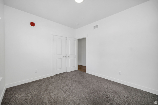 3115 South 200 West, Unit C201 Nibley, UT 84321 - Photo 15 of 23 Neutral white walls complemented by a gray carpet